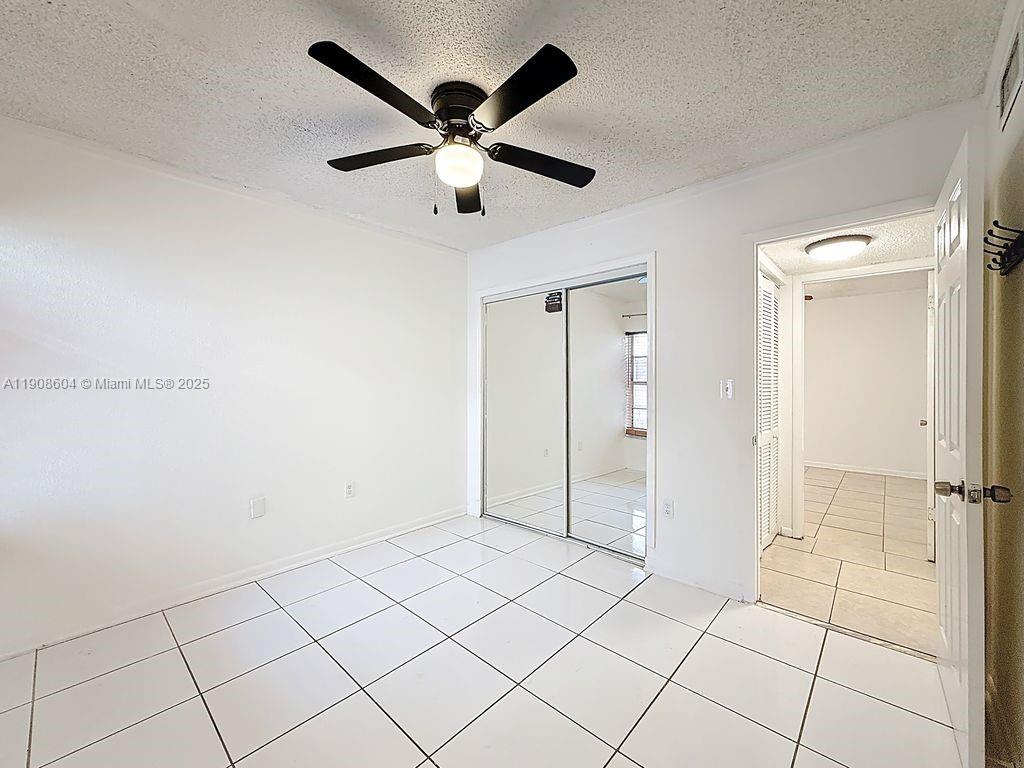 17600 Northwest 68th Avenue, Unit B2004 Hialeah, FL 33015 - Photo 14 of 24 a view of an empty room