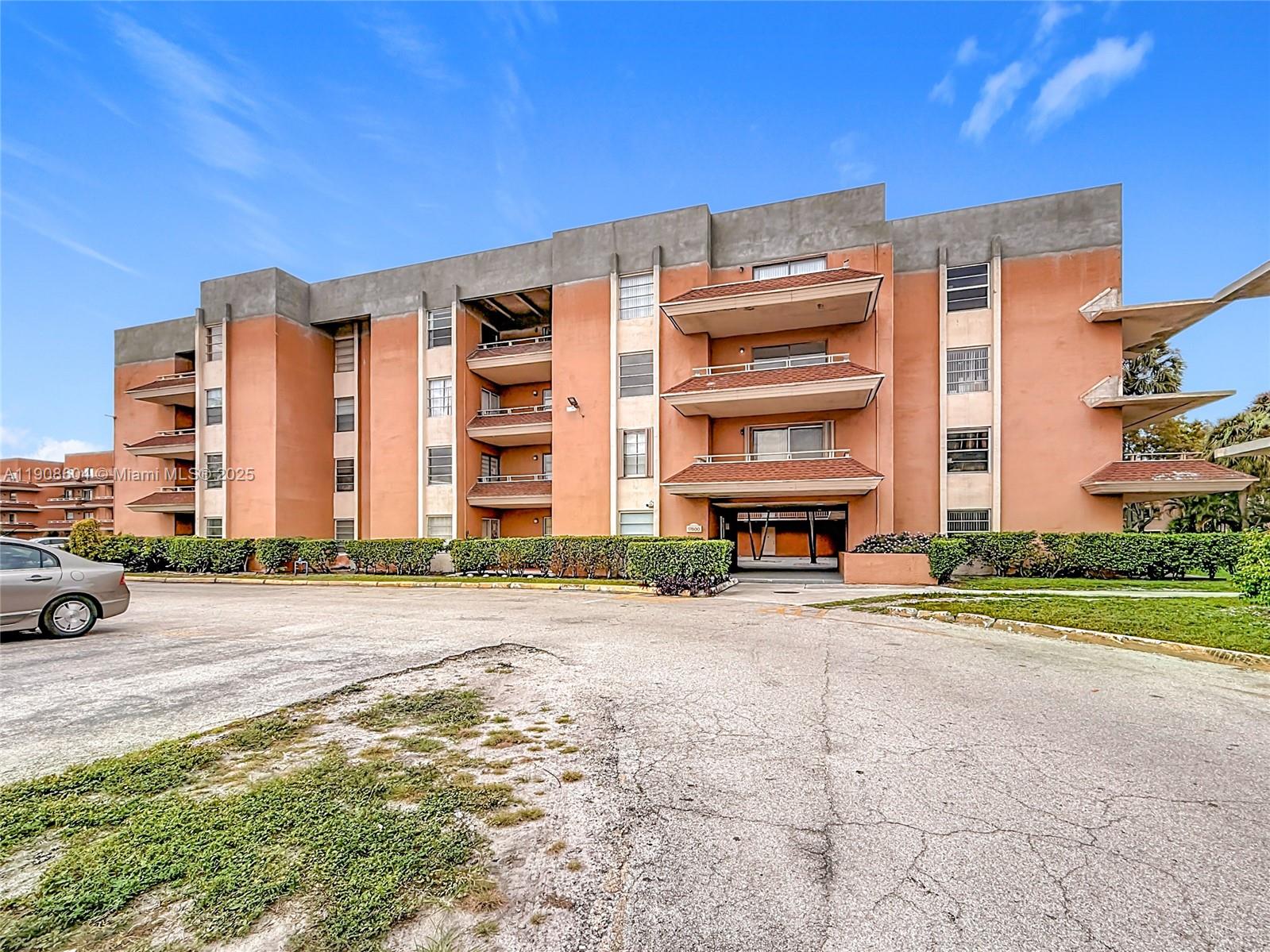 17600 Northwest 68th Avenue, Unit B2004 Hialeah, FL 33015 - Photo 18 of 24 a front view of a building