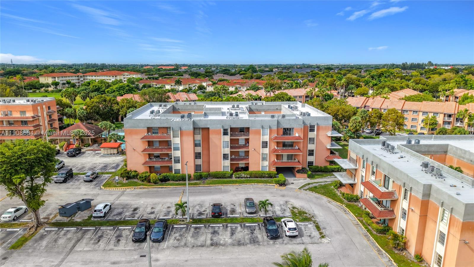 17600 Northwest 68th Avenue, Unit B2004 Hialeah, FL 33015 - Photo 23 of 24 a view of a big room with a big yard and plants
