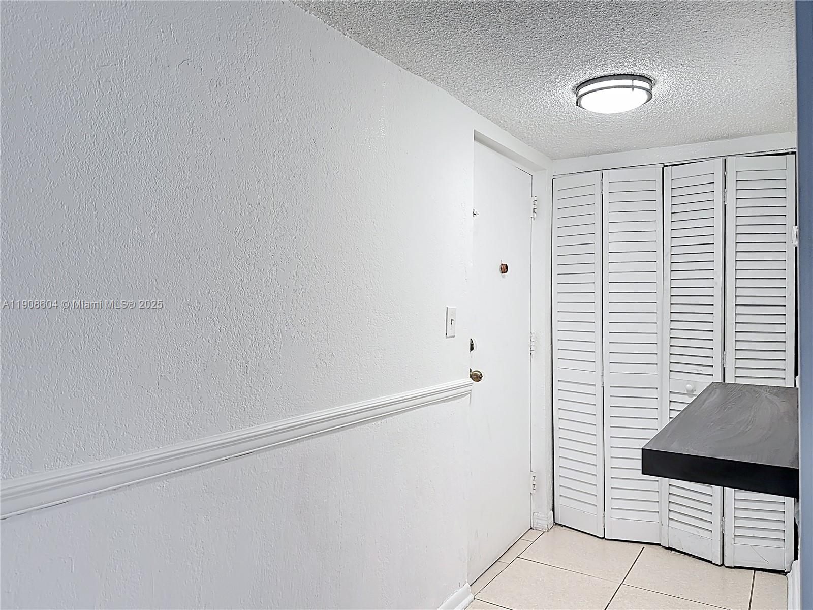 17600 Northwest 68th Avenue, Unit B2004 Hialeah, FL 33015 - Photo 3 of 24 a view of an empty room