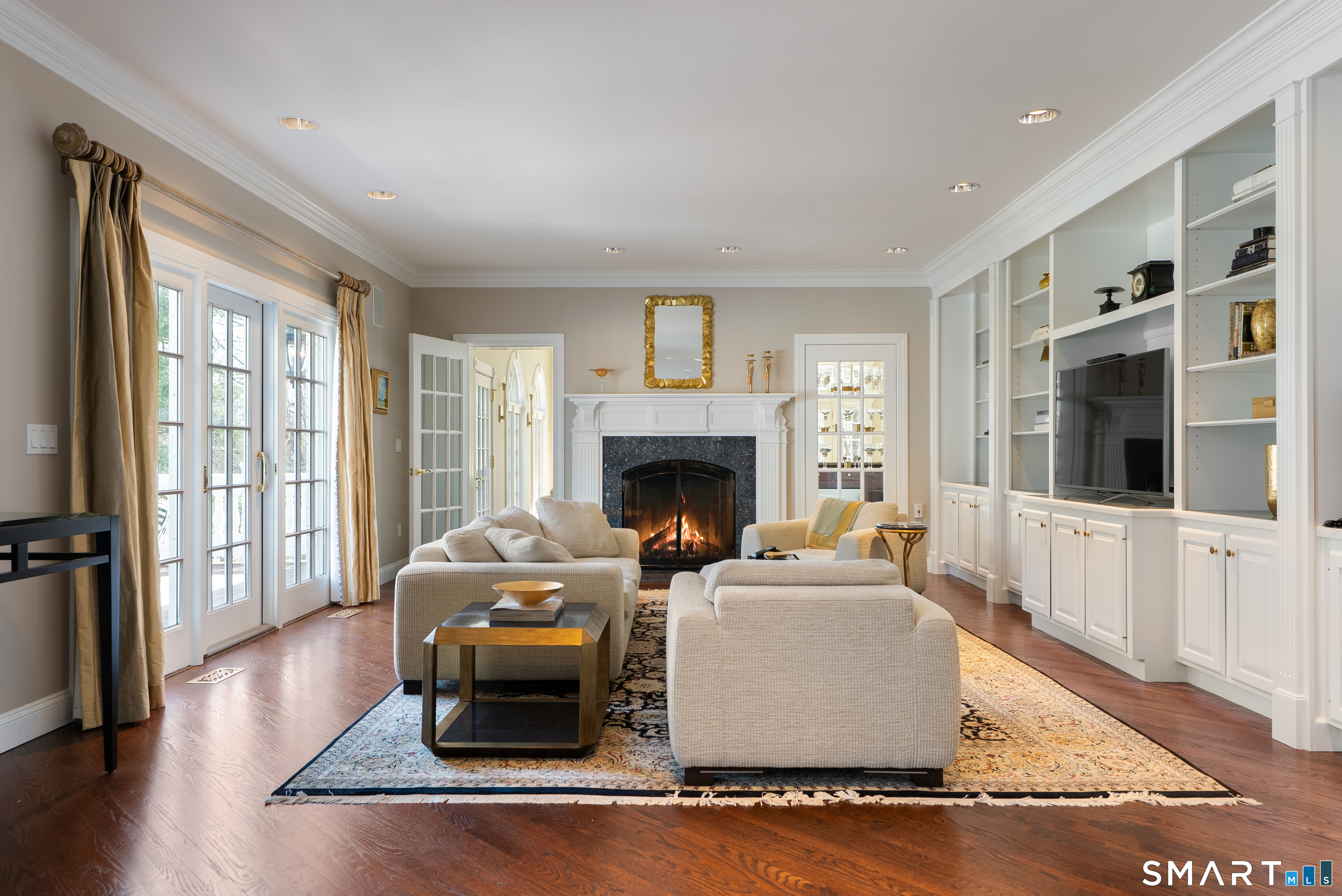 57 Thistledown Suffield, CT 06078 - Photo 16 of 39 a living room with furniture and a fireplace