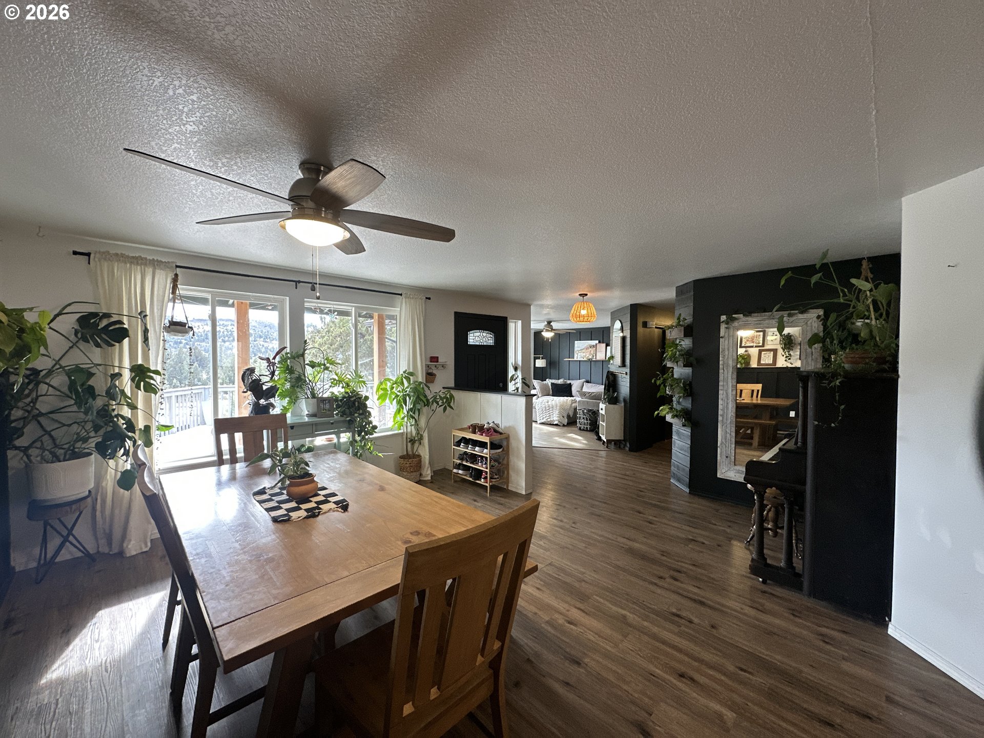 120 Valley View Drive John Day, OR 97845 - Photo 15 of 34 a view of a dining room with furniture window and wooden floor