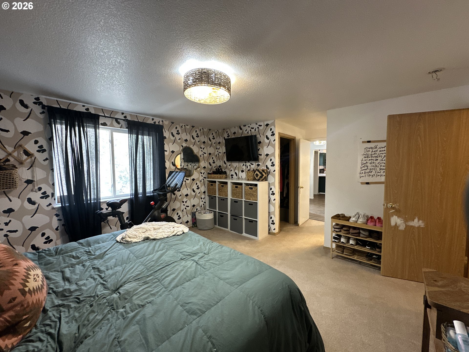 120 Valley View Drive John Day, OR 97845 - Photo 19 of 34 a bedroom with a bed and a large window