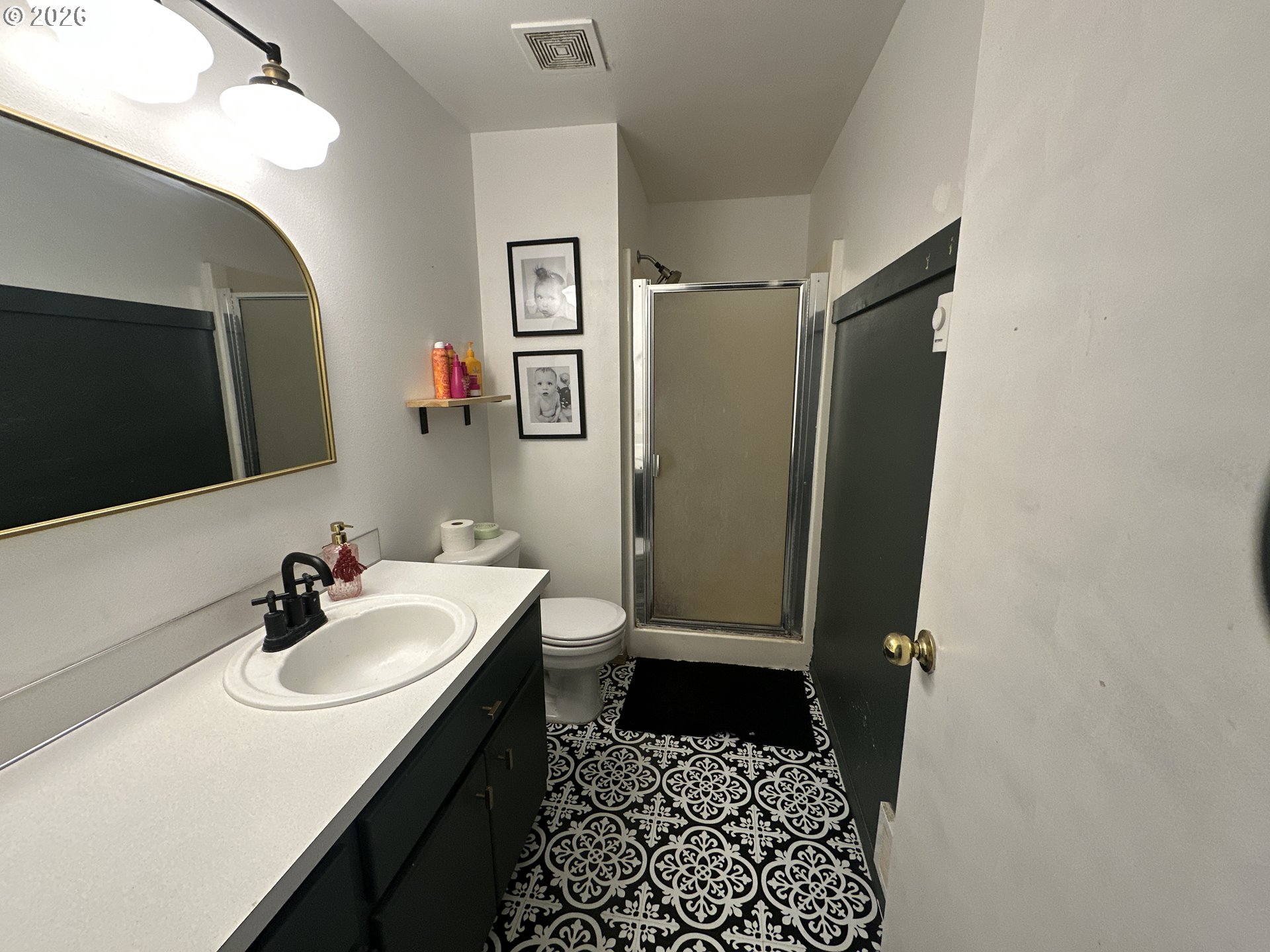 120 Valley View Drive John Day, OR 97845 - Photo 20 of 34 a bathroom with a sink a mirror and a toilet