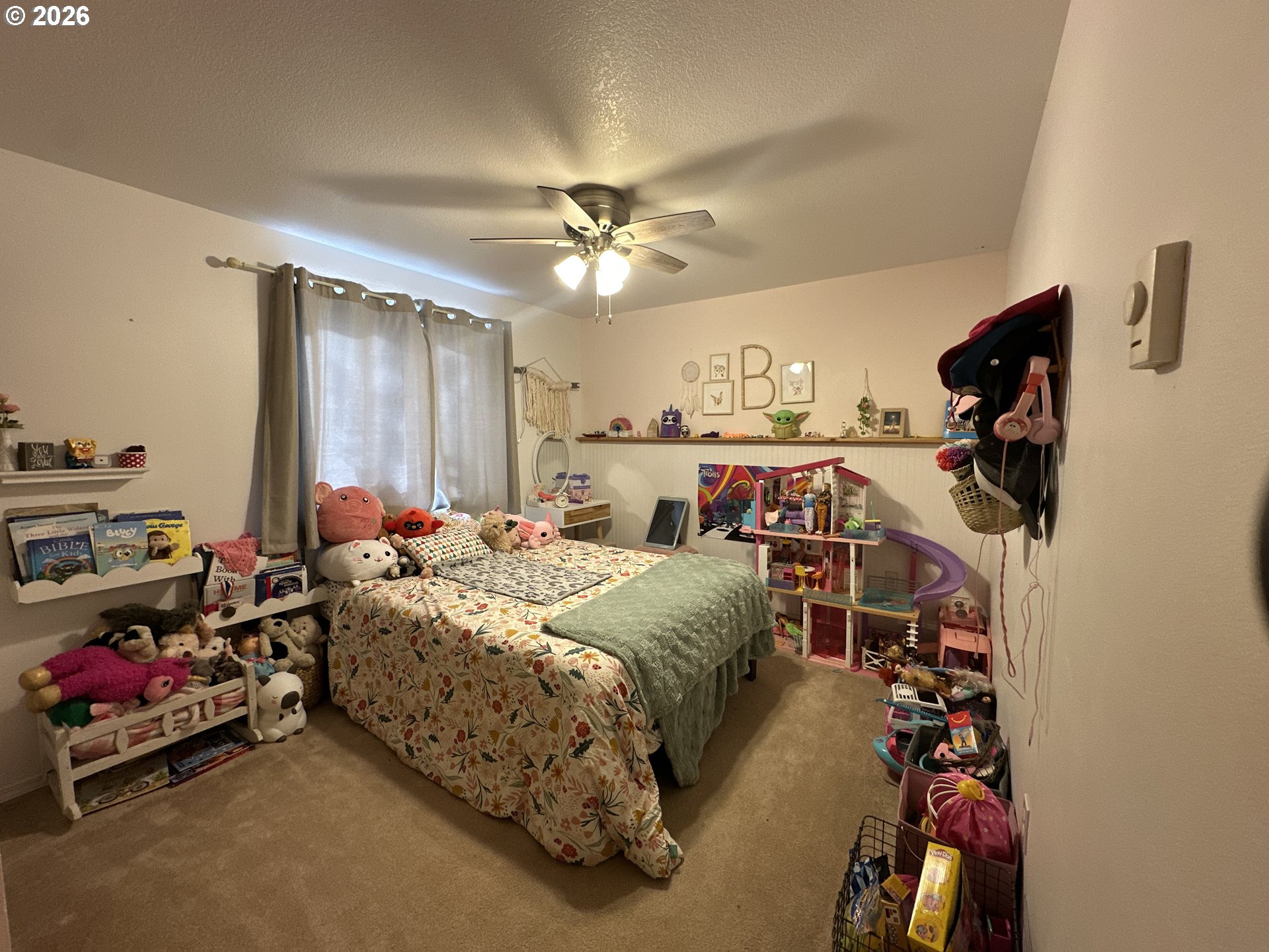 120 Valley View Drive John Day, OR 97845 - Photo 21 of 34 a bed room with a bed and a chandelier