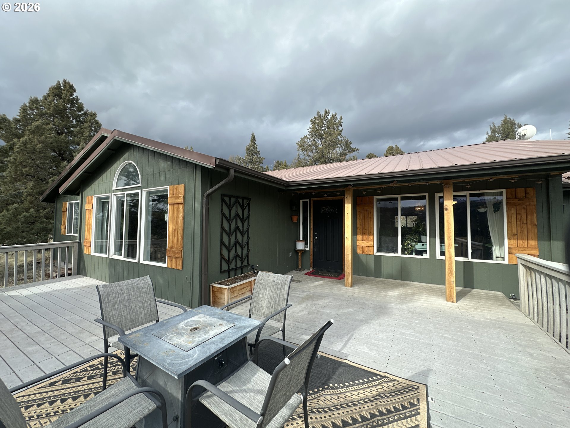 120 Valley View Drive John Day, OR 97845 - Photo 28 of 34 a front view of a house with a yard outdoor seating and barbeque oven