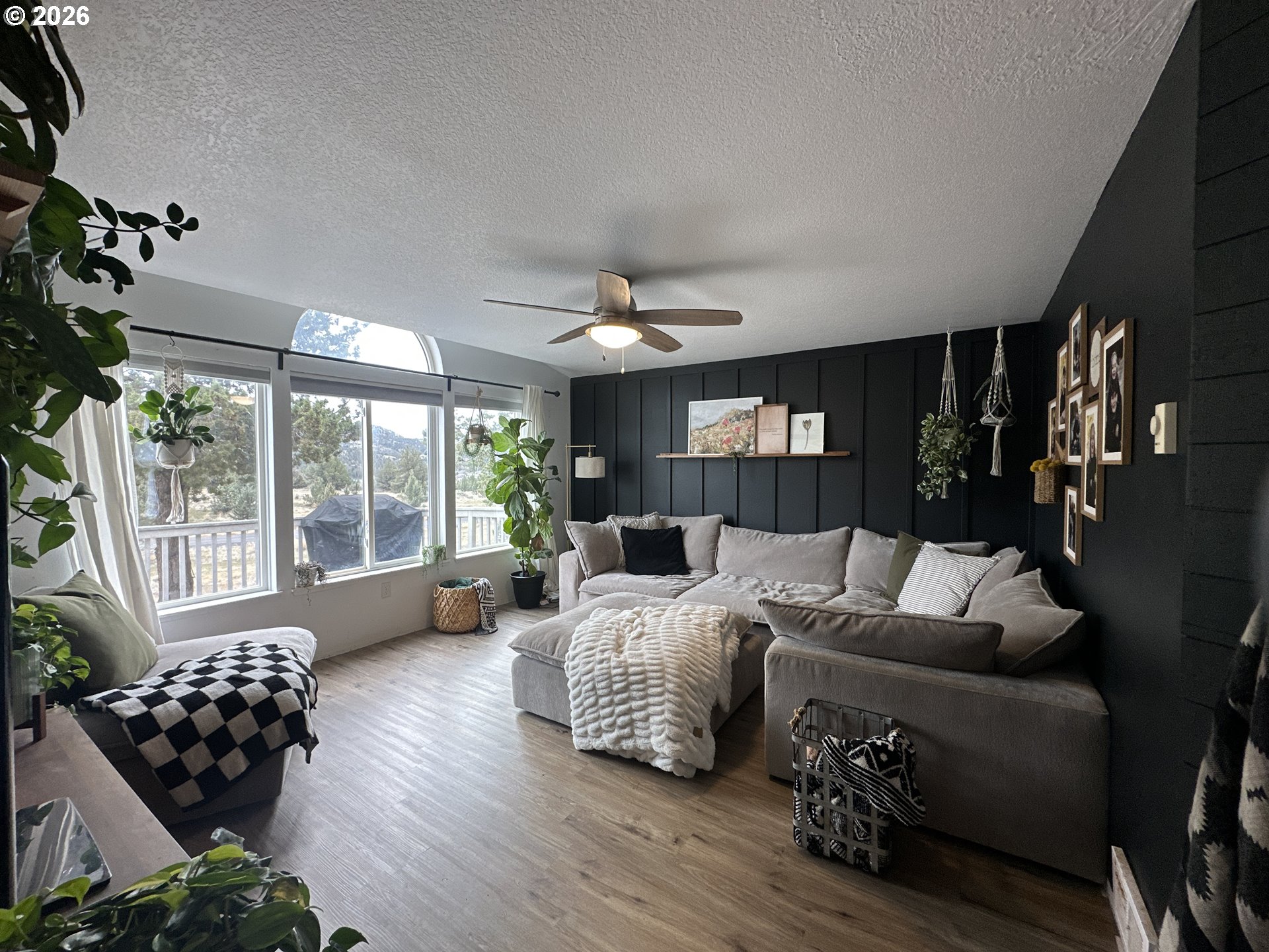 120 Valley View Drive John Day, OR 97845 - Photo 5 of 34 a bedroom with furniture and a large window