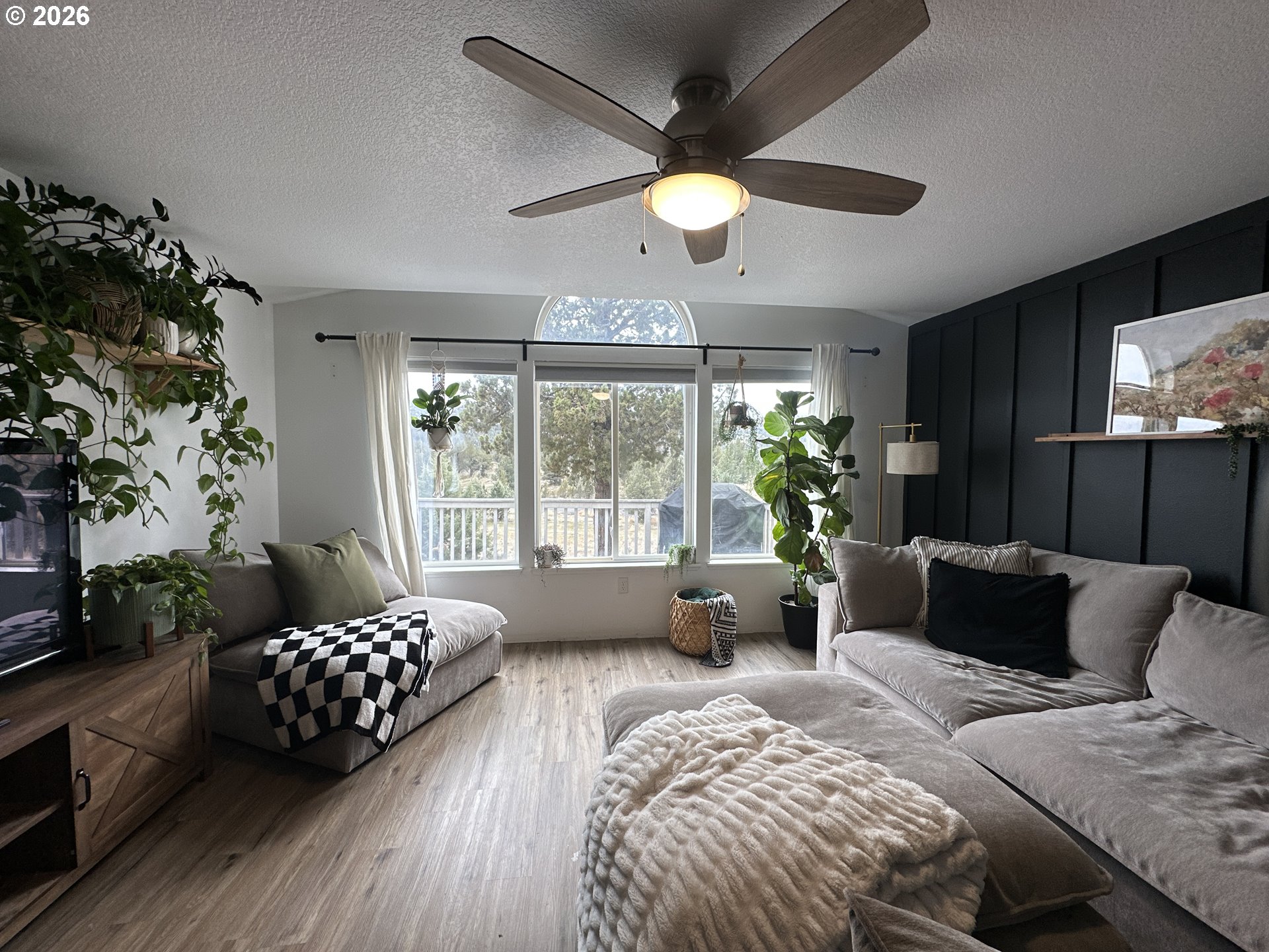120 Valley View Drive John Day, OR 97845 - Photo 6 of 34 a bedroom with furniture and a large window