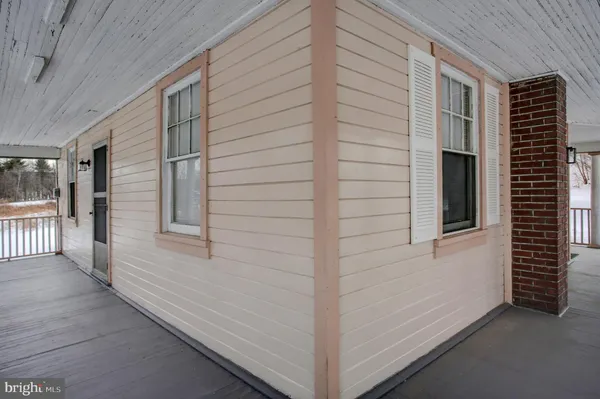 a view of front door and porch