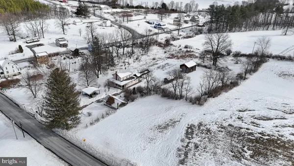 a view of a backyard of the house