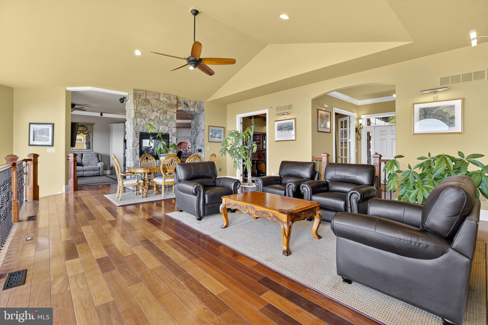 522 Halyard Way Enola, PA 17025 - Photo 21 of 60 a living room with furniture kitchen view and a wooden floor