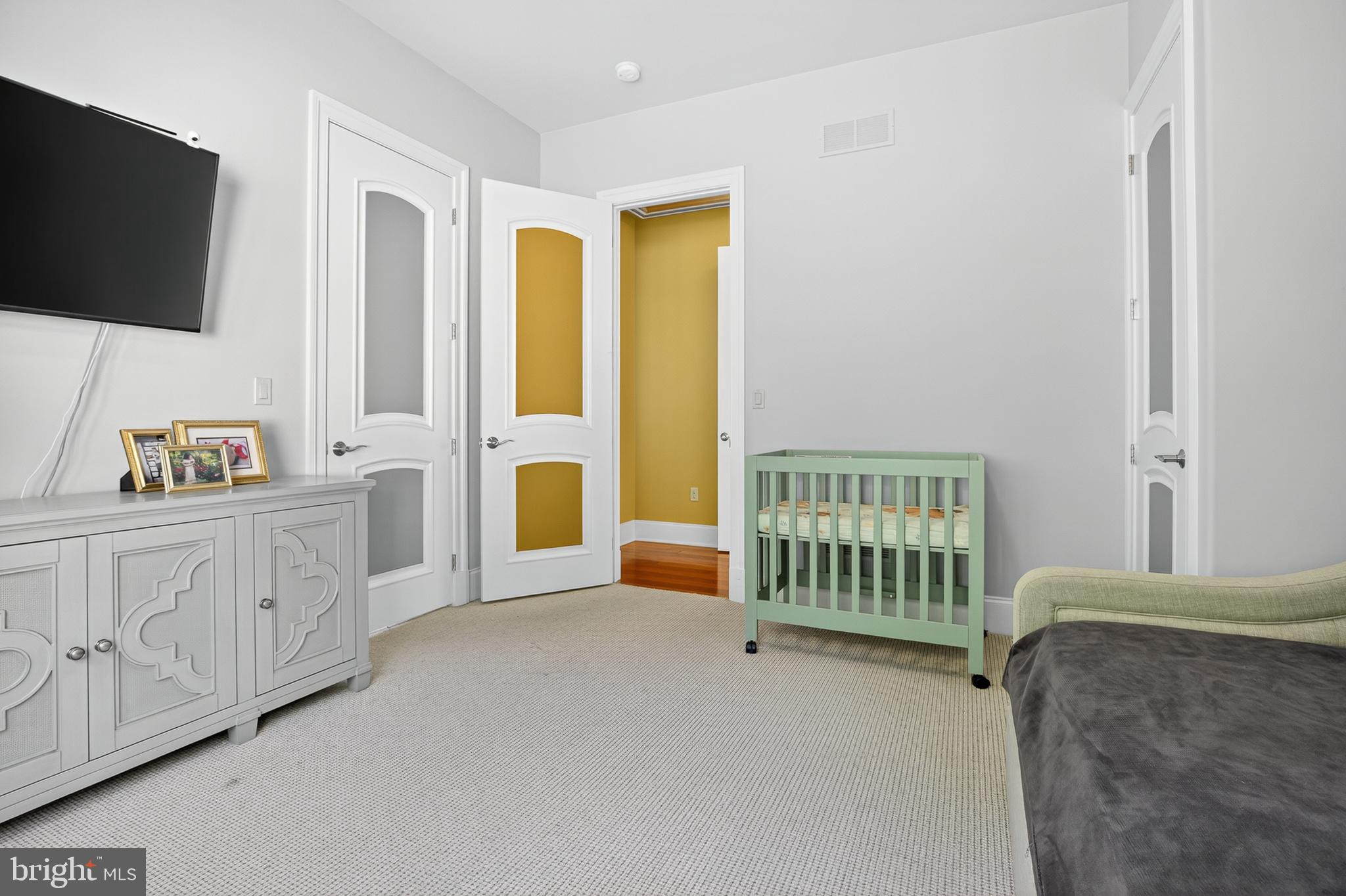 522 Halyard Way Enola, PA 17025 - Photo 50 of 60 a spacious bedroom with a bed and a flat screen tv