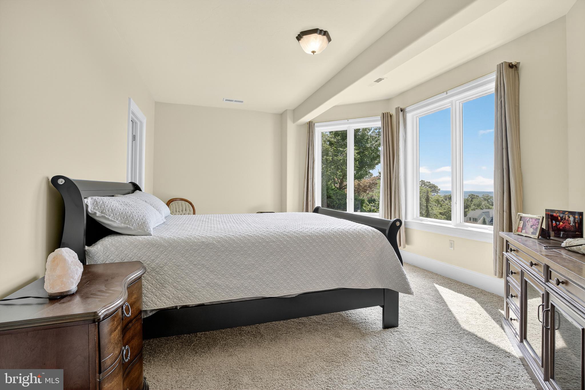 522 Halyard Way Enola, PA 17025 - Photo 55 of 60 a bedroom with a bed and large windows