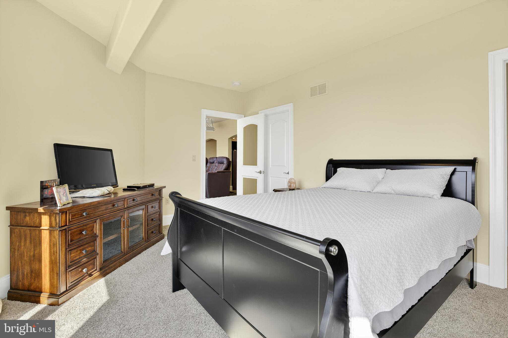 522 Halyard Way Enola, PA 17025 - Photo 56 of 60 a bedroom with a bed and flat screen tv