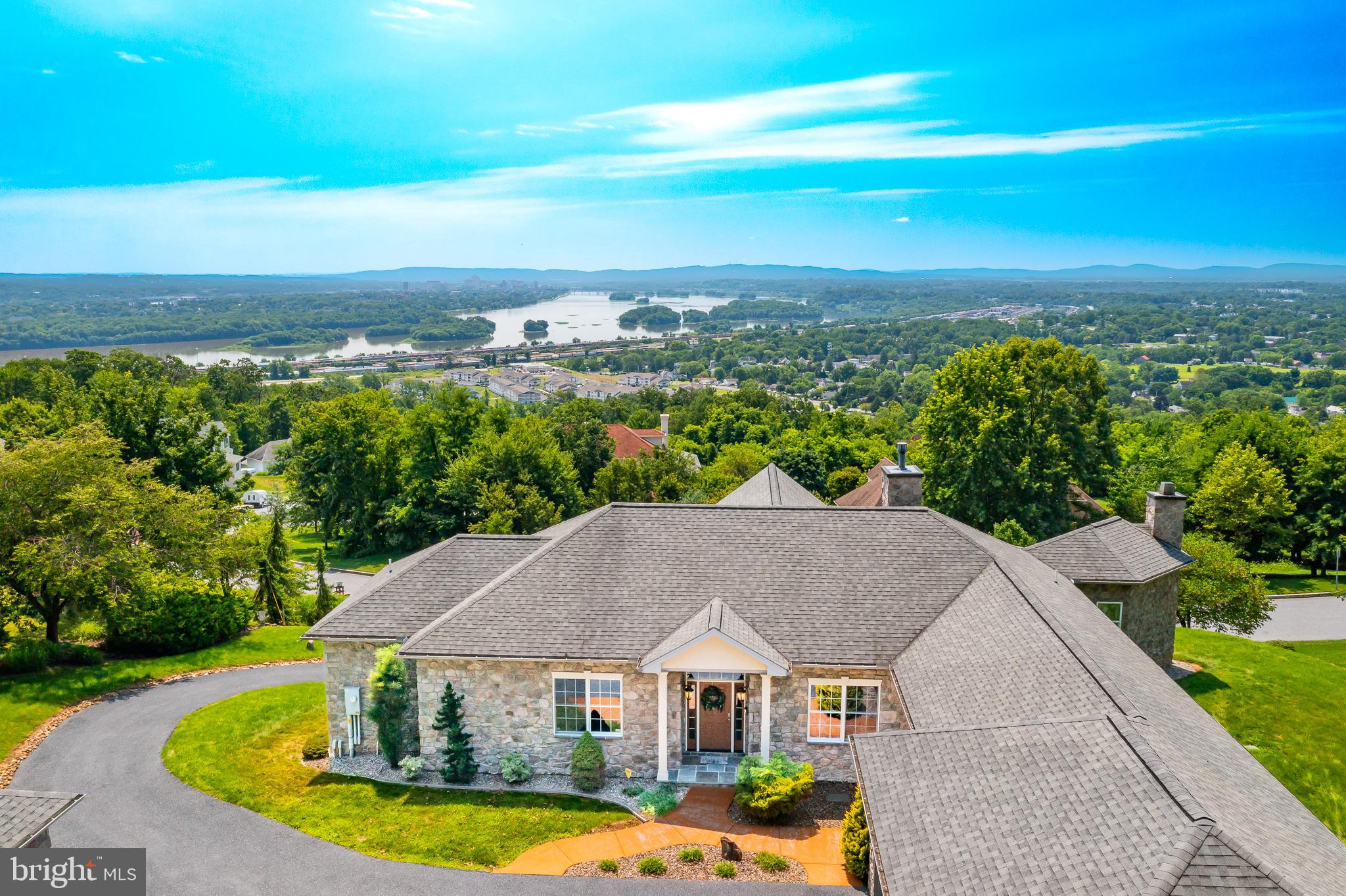 522 Halyard Way Enola, PA 17025 - Photo 10 of 60 an aerial view of a house with a garden and lake view
