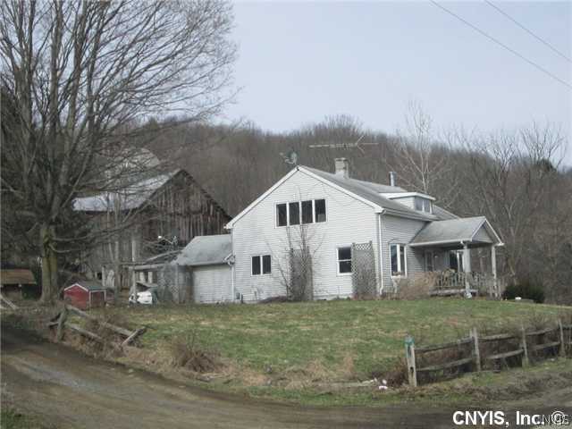 3974 West Cheningo Road Truxton, NY 13158 - Photo 1 of 1 Exterior Front House and Barn