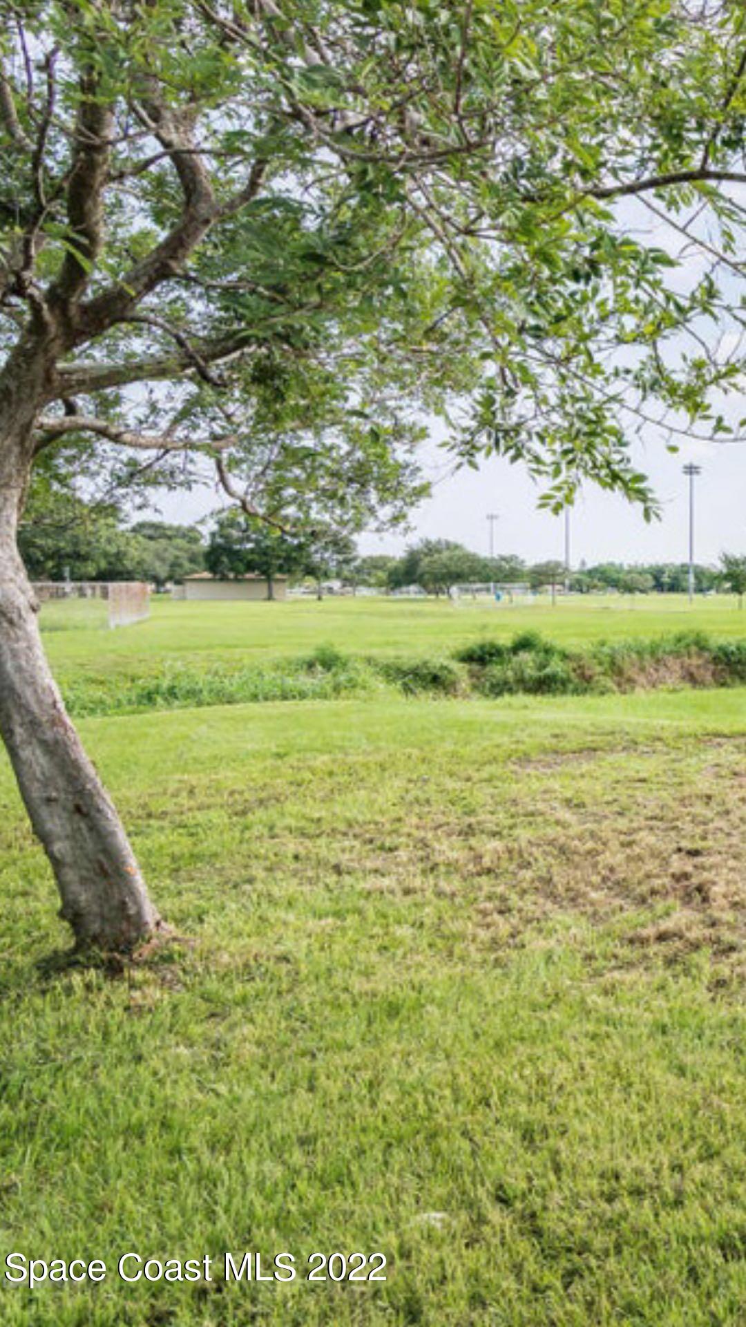3794 Town Square Boulevard Melbourne, FL 32901 - Photo 18 of 18 a view of an outdoor space and a yard