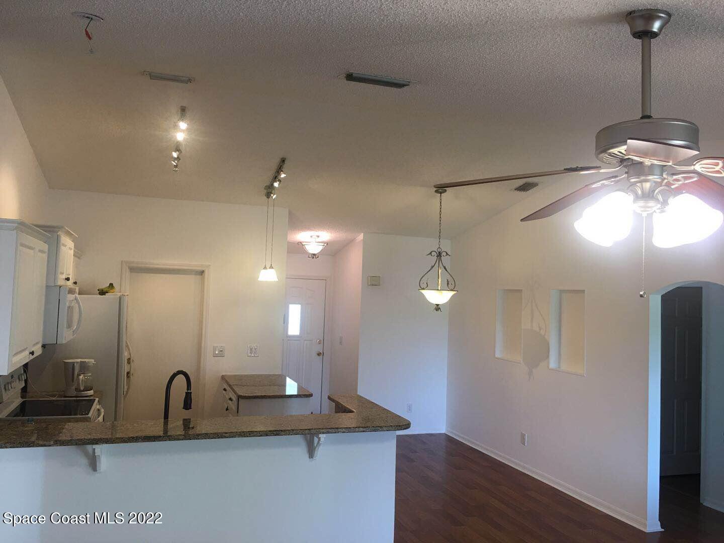 3794 Town Square Boulevard Melbourne, FL 32901 - Photo 4 of 18 a view of a double sink and a mirror