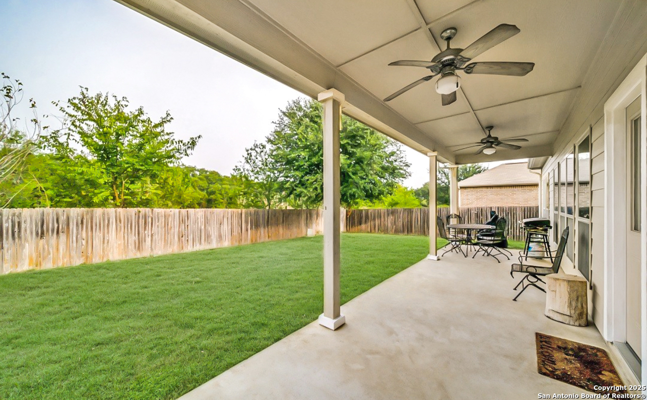 3113 Cameron River Schertz, TX 78108 - Photo 24 of 24 a view of a porch with furniture and a yard