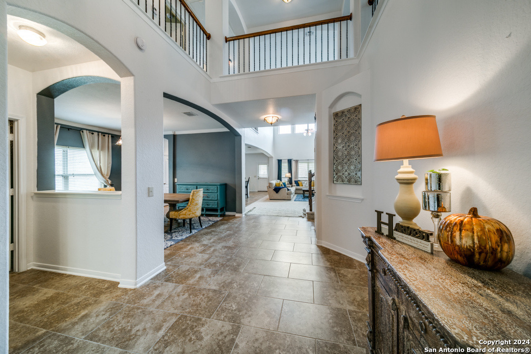 3113 Cameron River Schertz, TX 78108 - Photo 4 of 24 a living room with furniture and a lamp