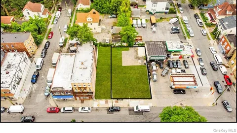 an aerial view of a city with lots of residential buildings