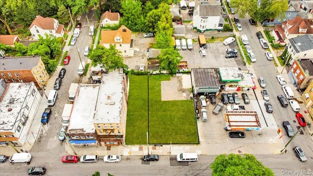 an aerial view of houses with outdoor space