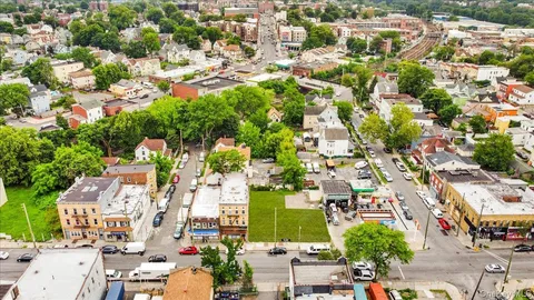 an aerial view of a city with lots of residential buildings