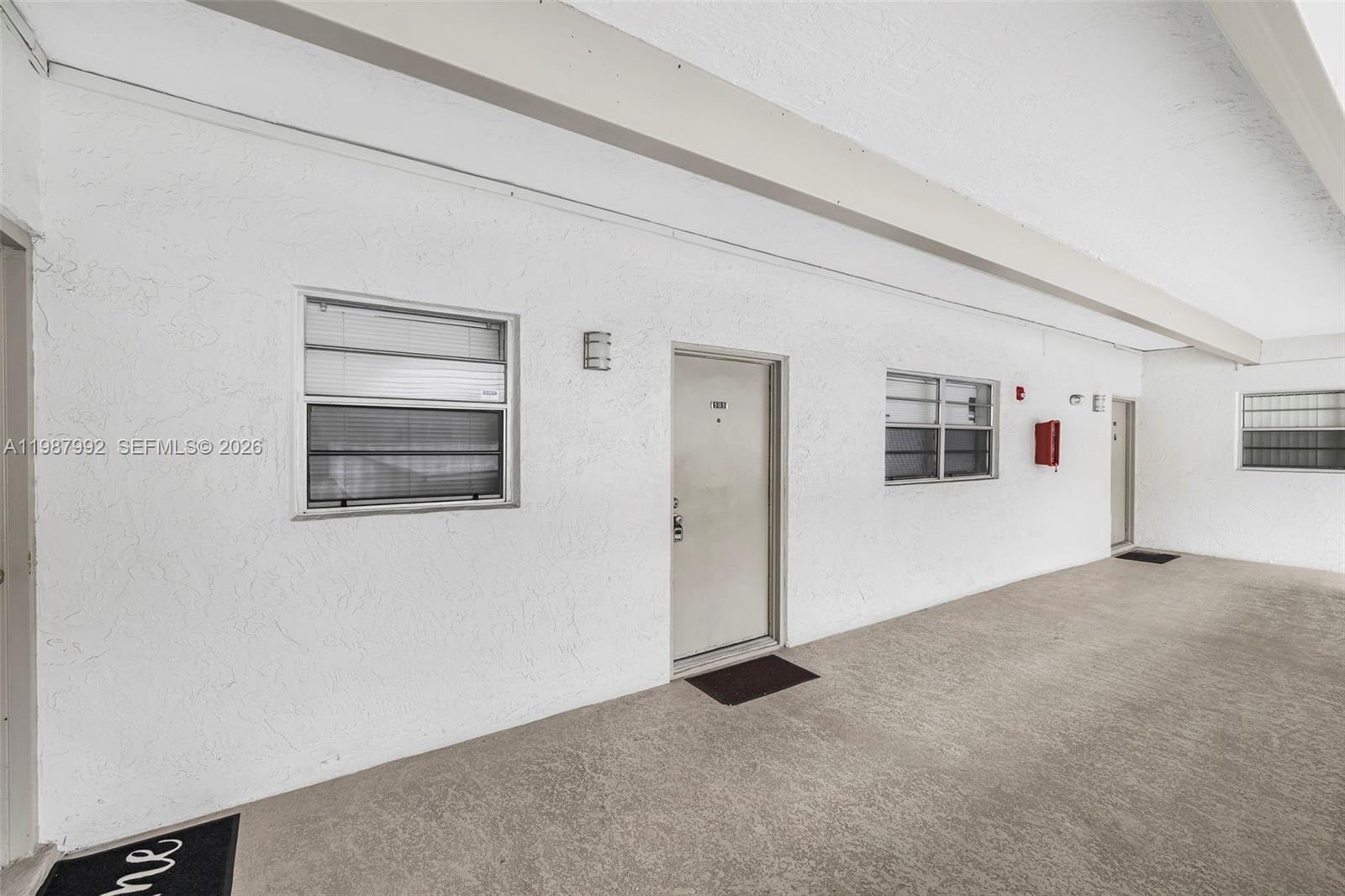 18001 North Bay Road, Unit 505 Sunny Isles Beach, FL 33160 - Photo 3 of 16 a view of a livingroom with an empty space and a window