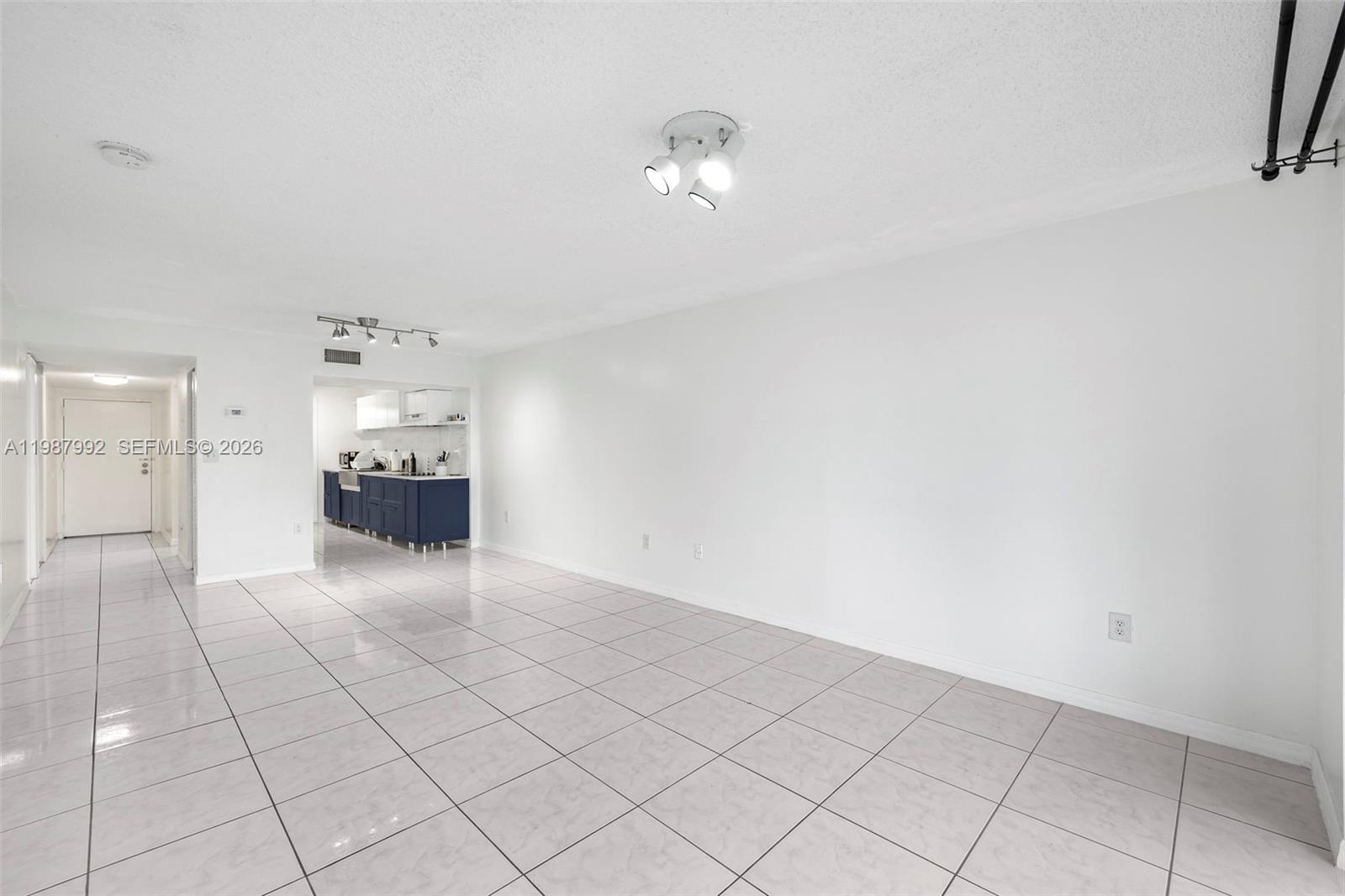 18001 North Bay Road, Unit 505 Sunny Isles Beach, FL 33160 - Photo 8 of 16 a view of empty room with kitchen
