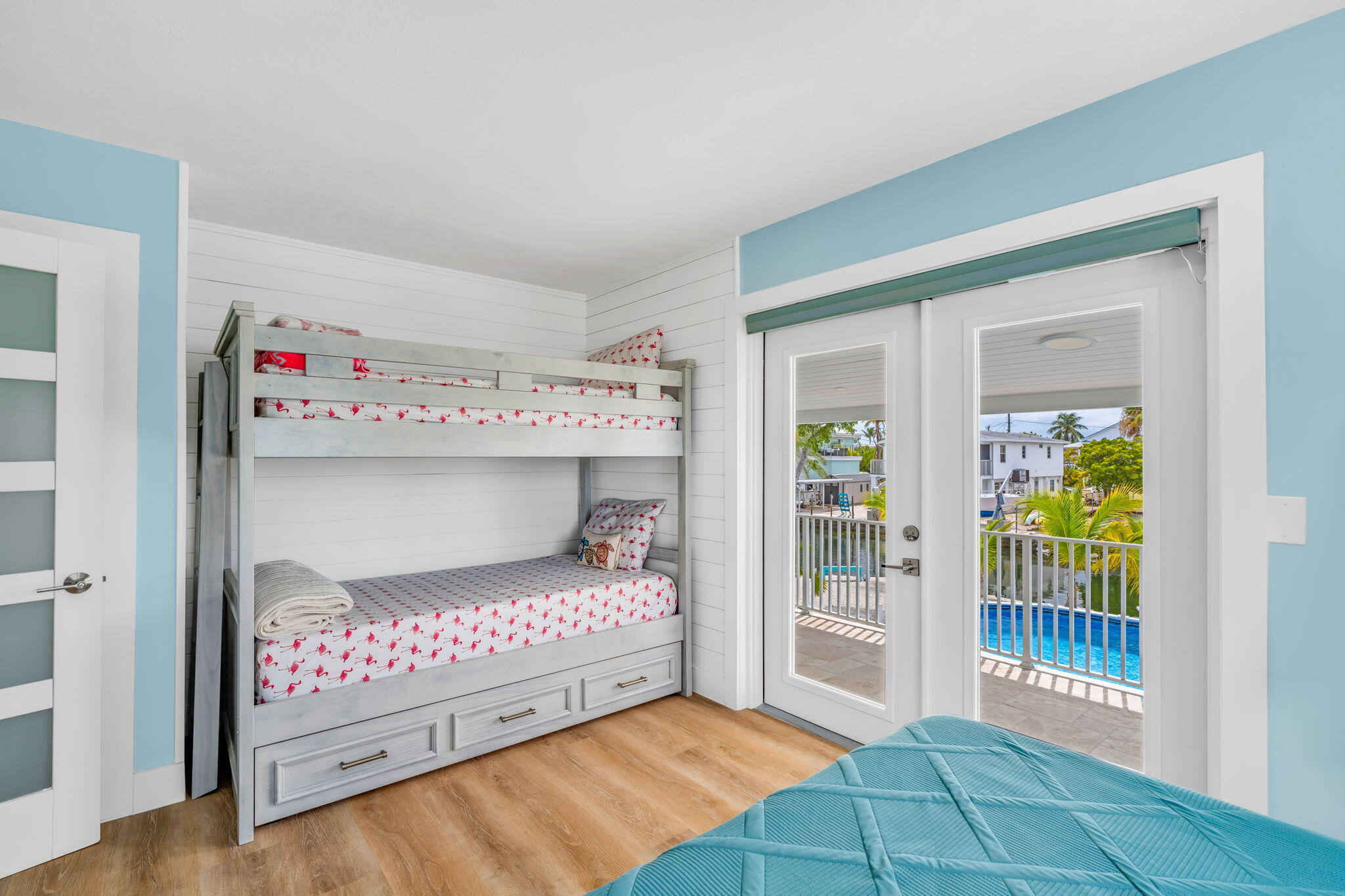 28538 John Silver Road Summerland Key, FL 33042 - Photo 16 of 45 a bedroom with a bed and a window