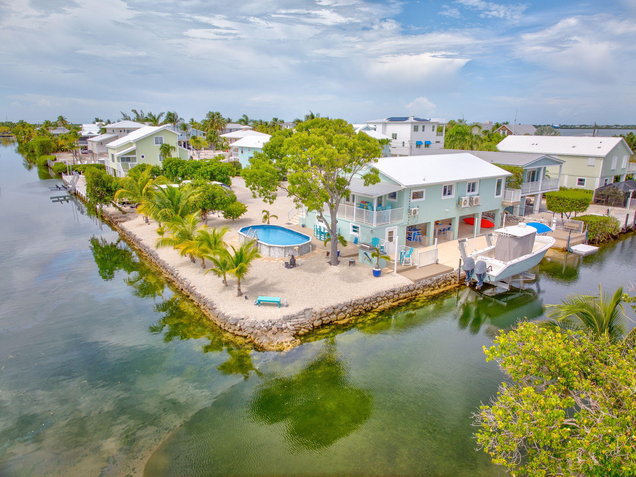 28538 John Silver Road Summerland Key, FL 33042 - Photo 2 of 45 a view of a lake with a house