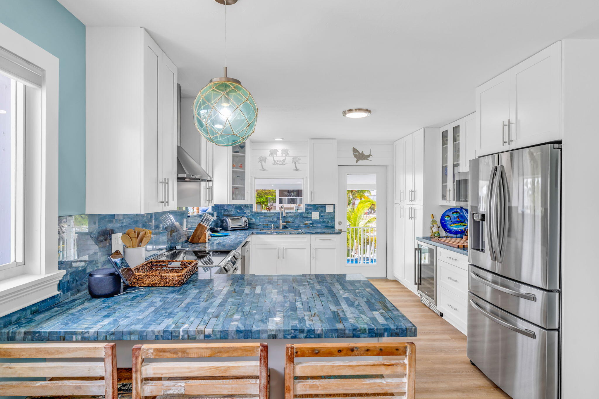 28538 John Silver Road Summerland Key, FL 33042 - Photo 9 of 45 a kitchen with stainless steel appliances granite countertop a refrigerator and a counter top space