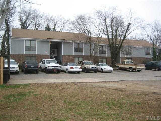 102 North State Street Raleigh, NC 27601 - Photo 3 of 13 a couple of cars parked in front of a house