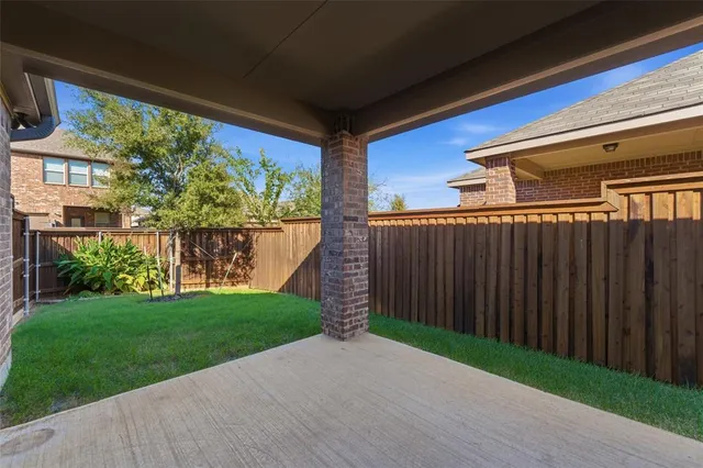 a view of a porch with a yard