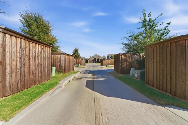 a view of a street with a houses