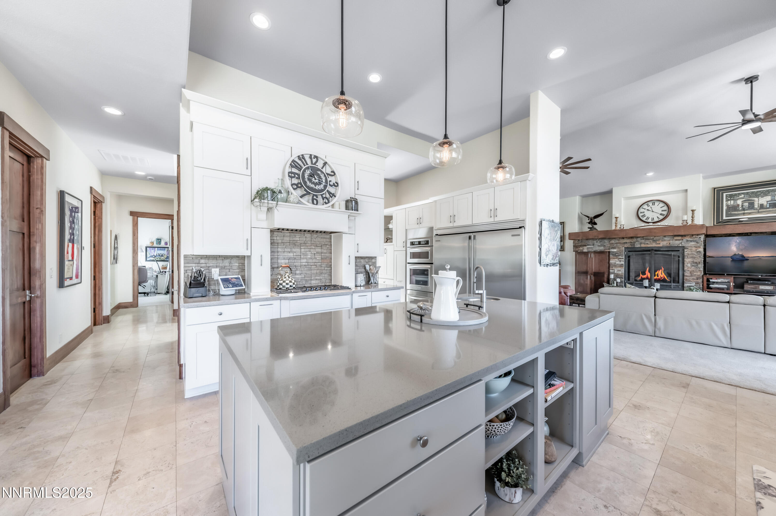 2195 Candle Rock Court Reno, NV 89523 - Photo 13 of 29 a large kitchen with stainless steel appliances lots of counter space and breakfast area