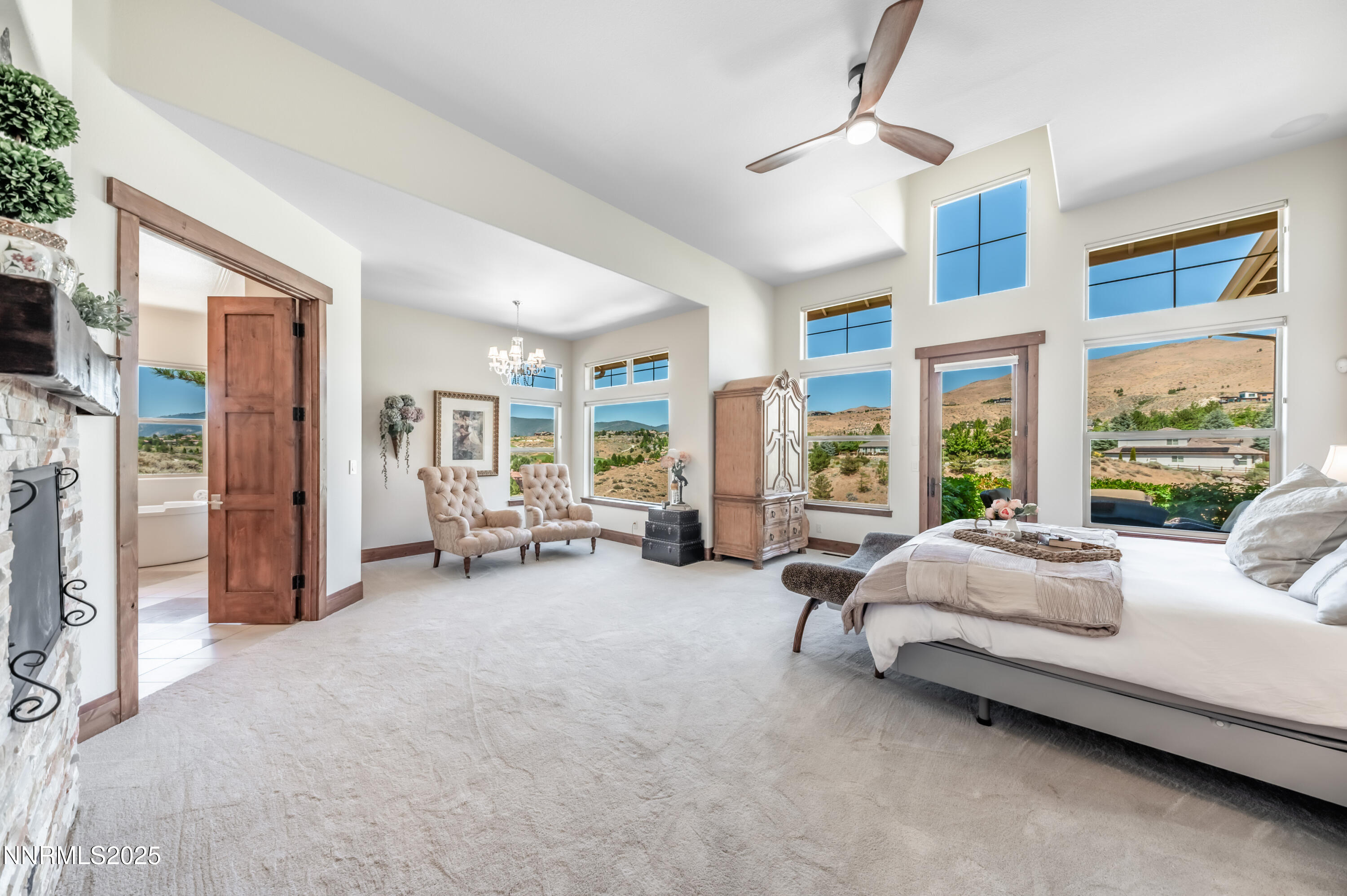 2195 Candle Rock Court Reno, NV 89523 - Photo 17 of 29 a living room with furniture and large windows