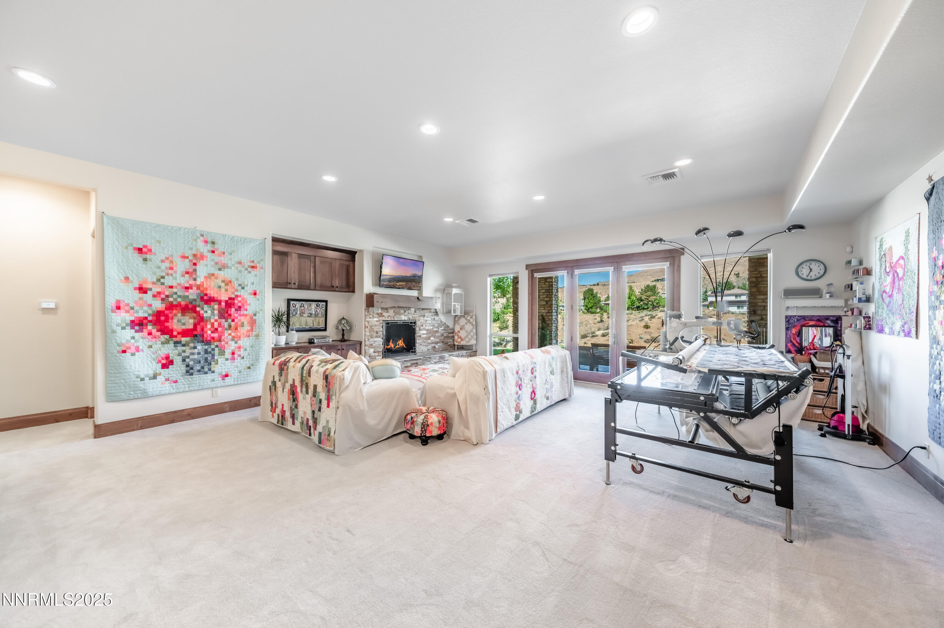2195 Candle Rock Court Reno, NV 89523 - Photo 21 of 29 a bed room with furniture and a flat screen tv