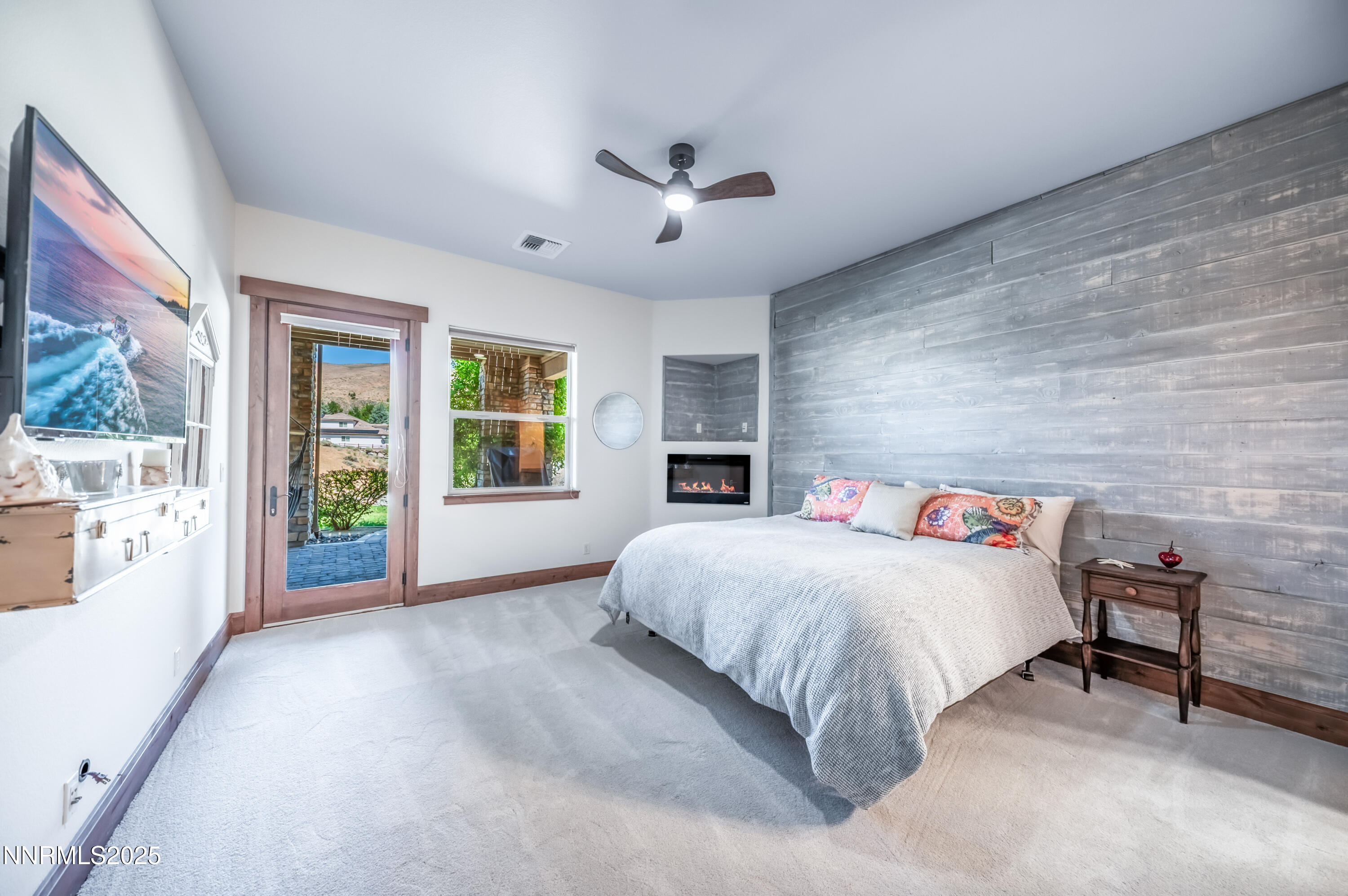 2195 Candle Rock Court Reno, NV 89523 - Photo 23 of 29 a bedroom with a large bed and a window