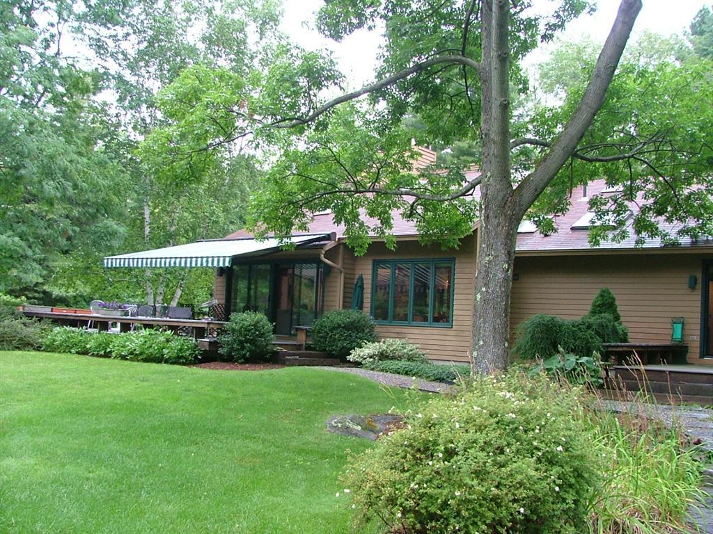 7 Old Tree Farm Road Stockbridge, MA 01266 - Photo 2 of 21 a front view of a house with garden