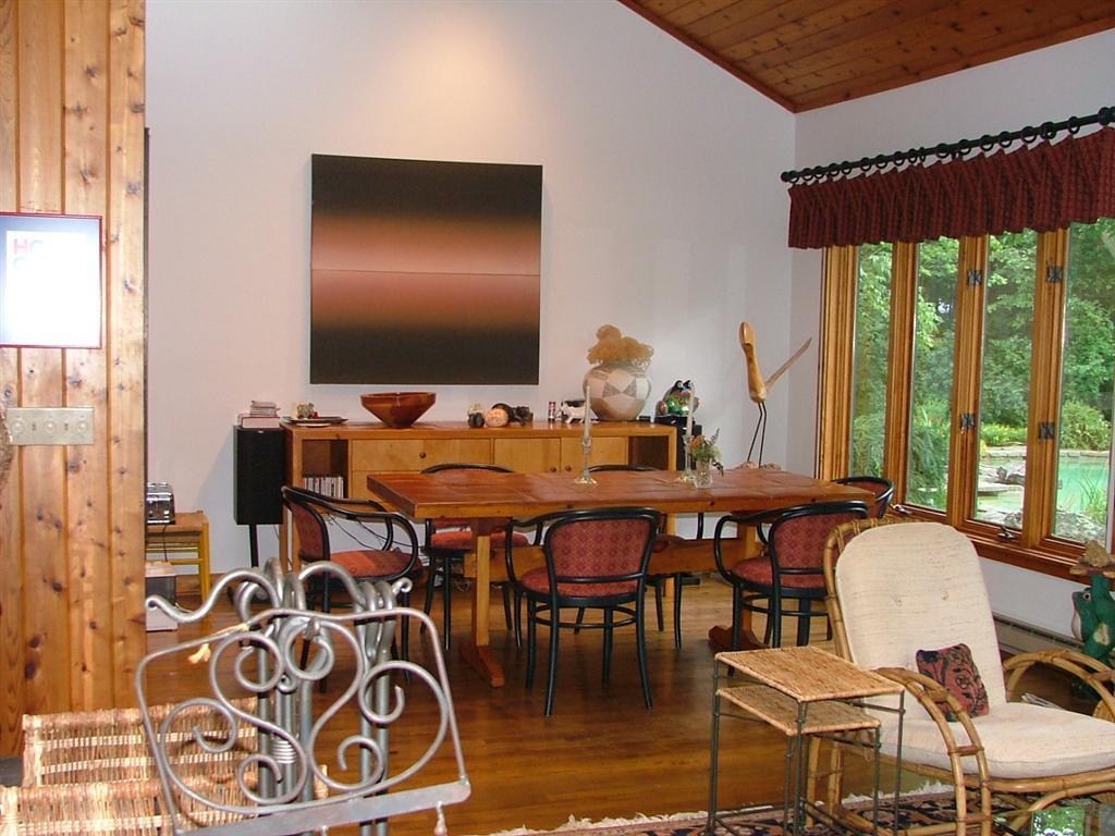 7 Old Tree Farm Road Stockbridge, MA 01266 - Photo 11 of 21 a dining room with furniture a rug and wooden floor