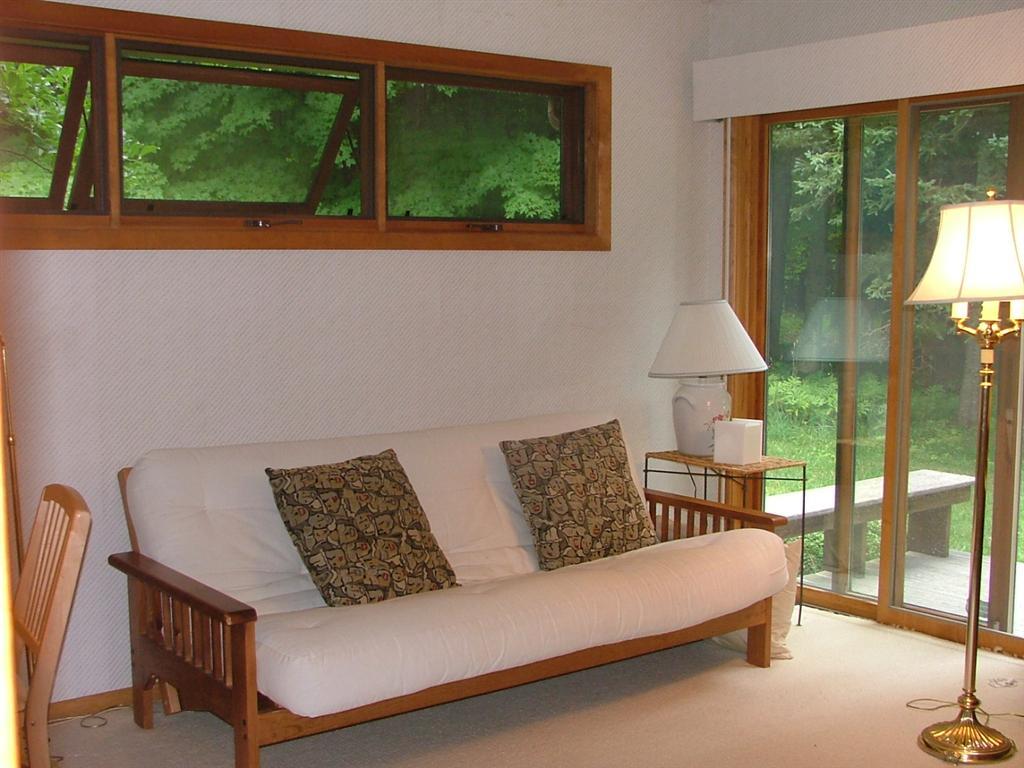 7 Old Tree Farm Road Stockbridge, MA 01266 - Photo 16 of 21 a living room with furniture and a floor to ceiling window