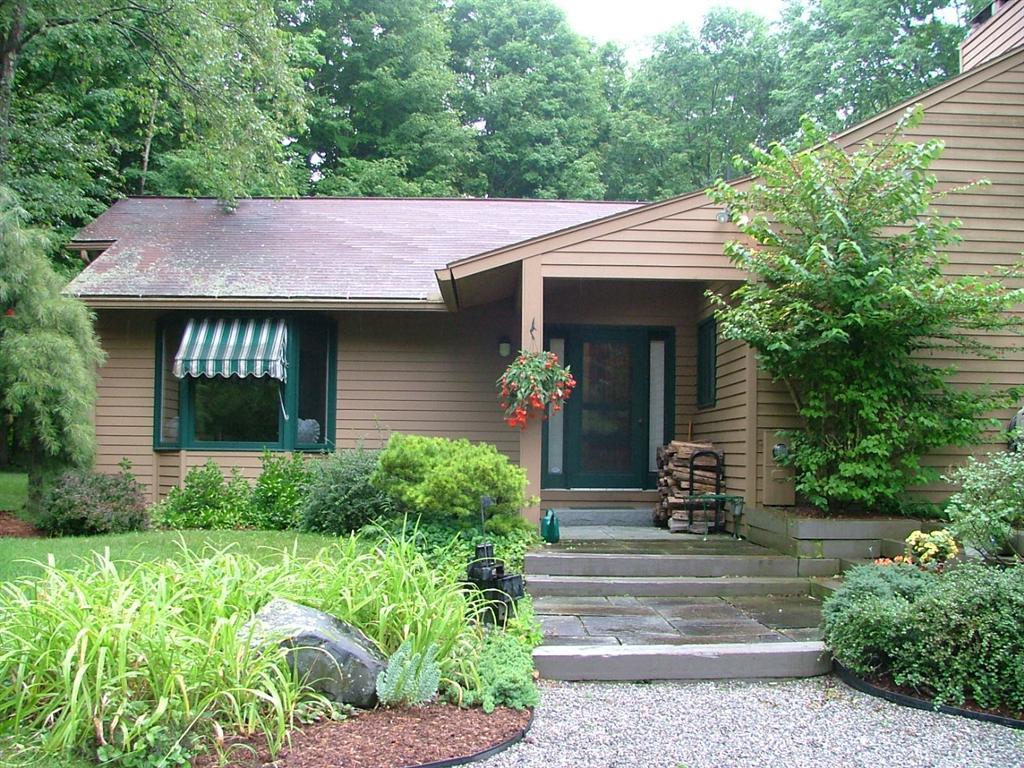 7 Old Tree Farm Road Stockbridge, MA 01266 - Photo 5 of 21 a house view with a garden space