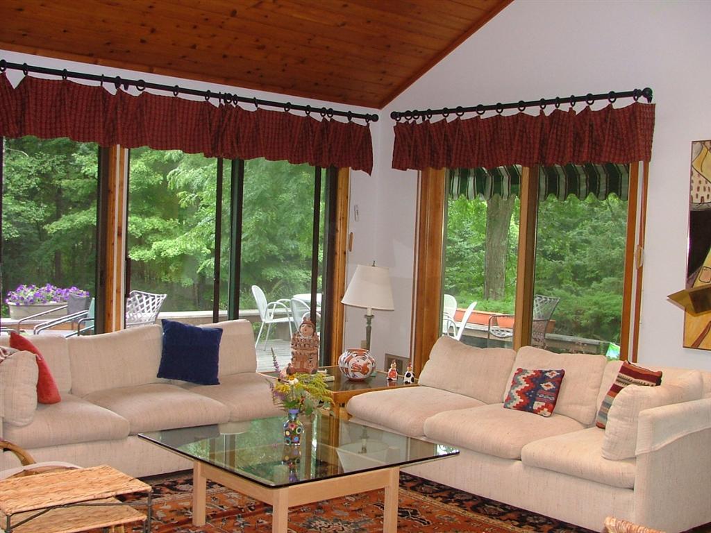 7 Old Tree Farm Road Stockbridge, MA 01266 - Photo 8 of 21 a living room with patio furniture and a garden