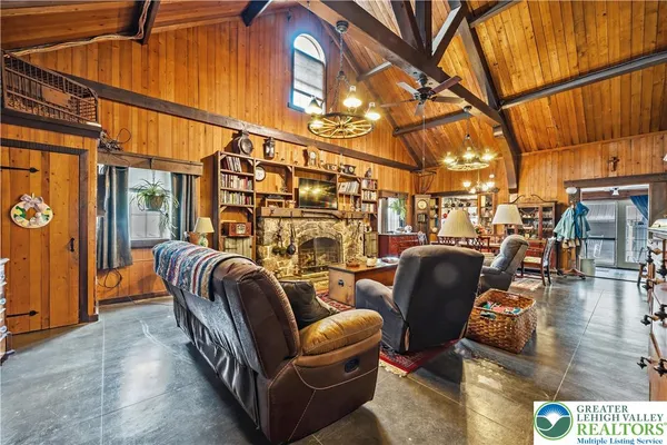 a view of livingroom with furniture and staircase