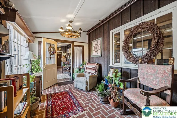 a view of a porch with furniture