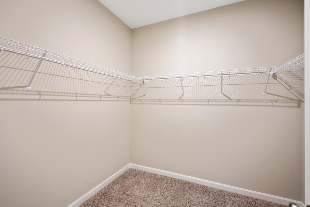 267 Madden Rose Loop Garner, NC 27529 - Photo 41 of 41 a view of a rack on the wall