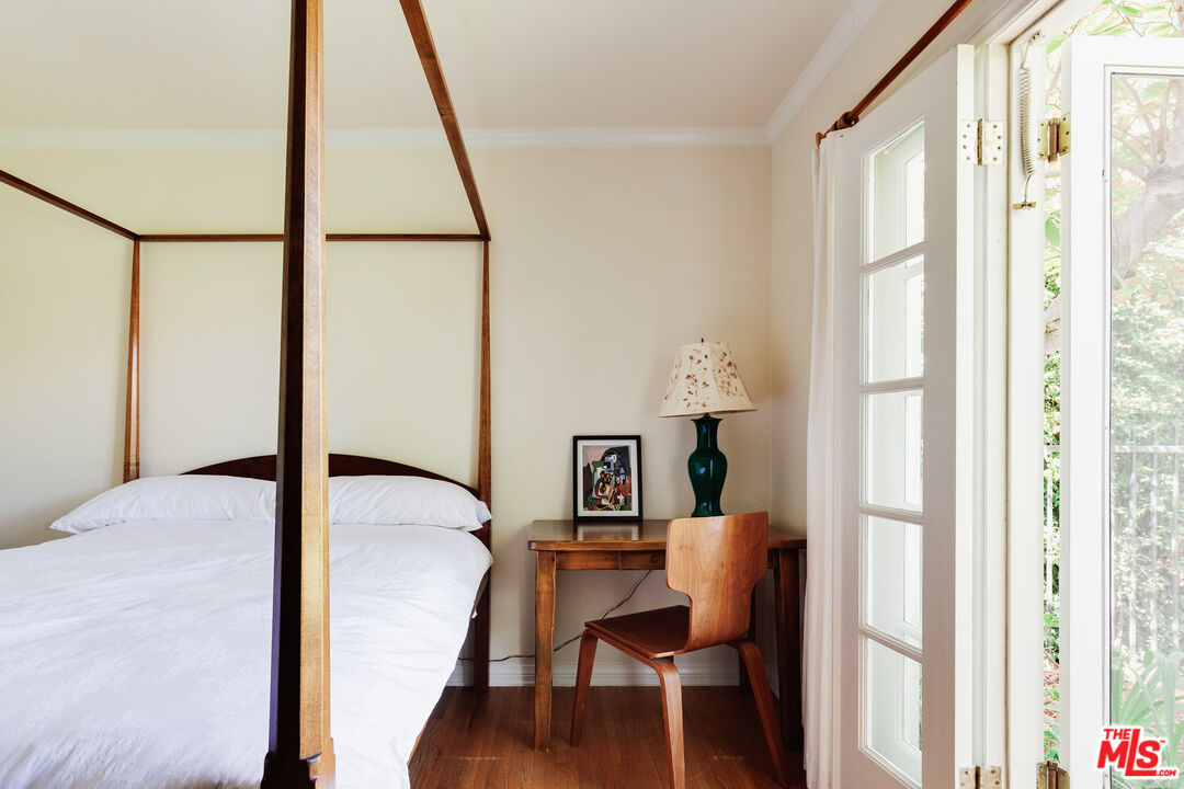 9018 Elevado Avenue West Hollywood, CA 90069 - Photo 21 of 32 a view of a room with furniture and window