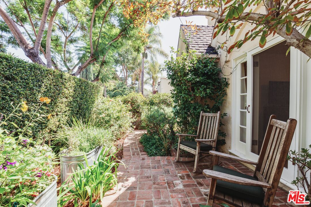 9018 Elevado Avenue West Hollywood, CA 90069 - Photo 22 of 32 a view of chair in wooden deck