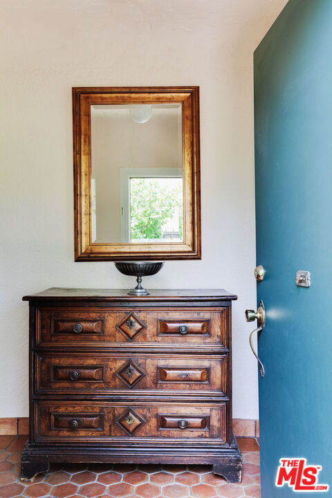 9018 Elevado Avenue West Hollywood, CA 90069 - Photo 6 of 32 a view of door with wooden floor